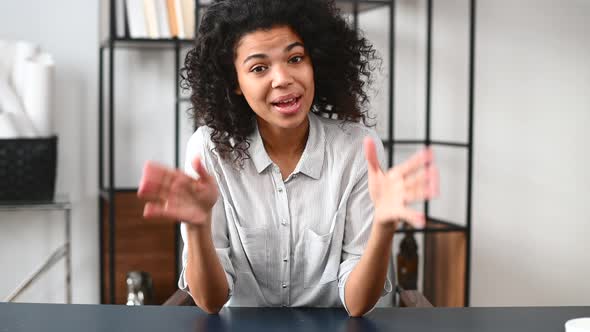 An AfricanAmerican Young Woman in the Modern Office Space