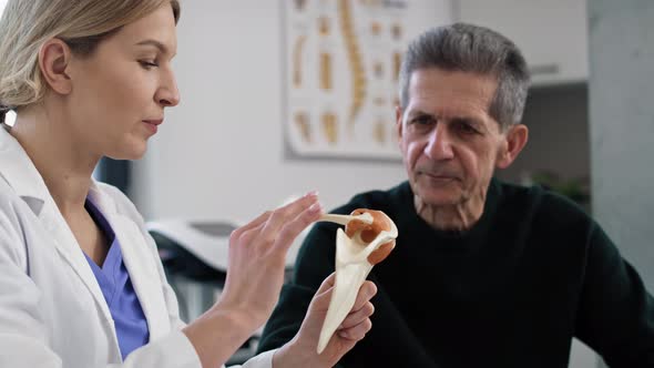 Female caucasian doctor talking with her patient. Shot with RED helium camera in 8K.