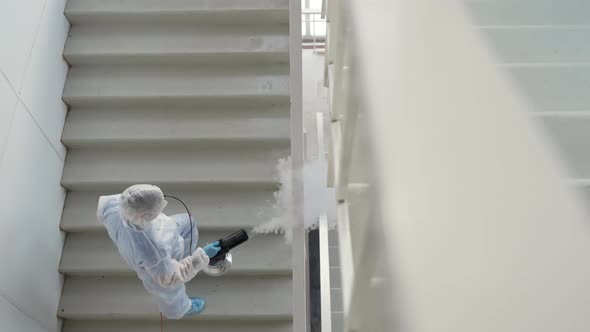 Sanitizing Fog Machine for Disinfecting Railings in Building