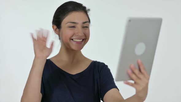 Video Chat on Tablet By Indian Woman White Background