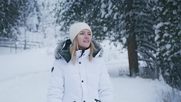 Portrait of Positive Smiling Woman Walking in Winter Wonderland Forest Aspen 6K