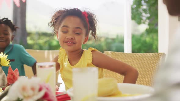 African American girl spending time in garden