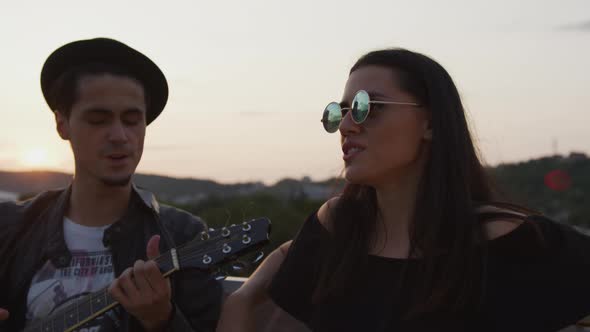 Young couple singing together