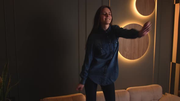 Caucasian Woman Dance on Sofa at Home