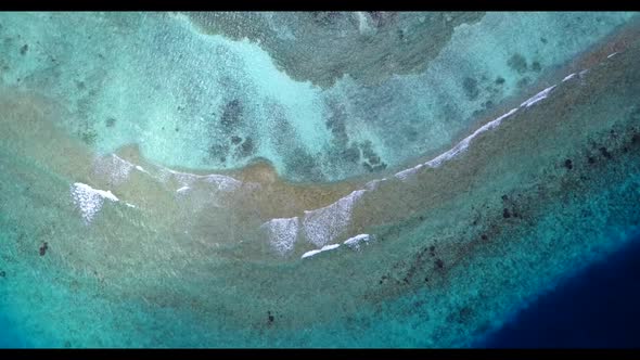Aerial drone view tourism of beautiful island beach holiday by turquoise sea and clean sandy backgro