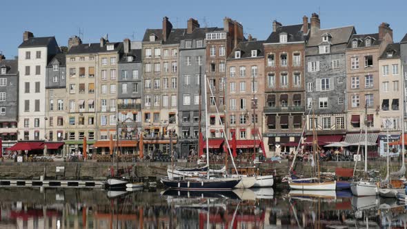 HONFLEUR, FRANCE - SEPTEMBER 2016 Facades and architecture water reflections of famous northern Norm