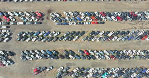 Aerial View of Auto Auction Many Used Car Lot Parked Distributed in a Parking