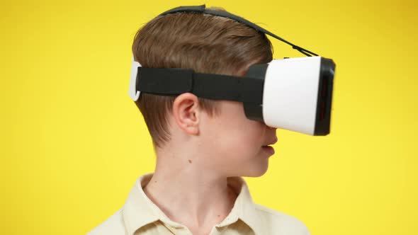 Closeup Face of Boy in VR Headset Turning Head and Screaming