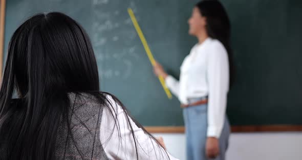 Student and teacher in the classroom