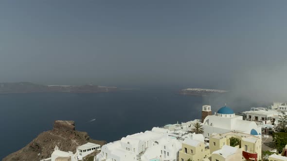 Aerial view of traditional houses on Santorini island, Imerovigli, Greece.