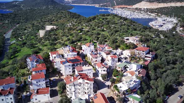 The top view from the drone of Kas resorts, bay, yahts, city in Mugla in Turkey