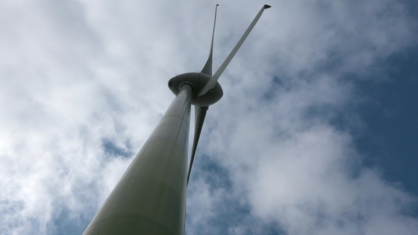 Environment friendly concept. Electrical windmill or wind turbine with rotating blades. Denmark.