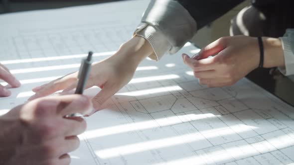 Businessmen are Discussing the Project at a Meeting