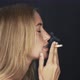 Slow motion shot of woman smoking cigarette and shaking head in disgust - VideoHive Item for Sale