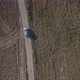 Drone view of a car driving in the countryside - VideoHive Item for Sale