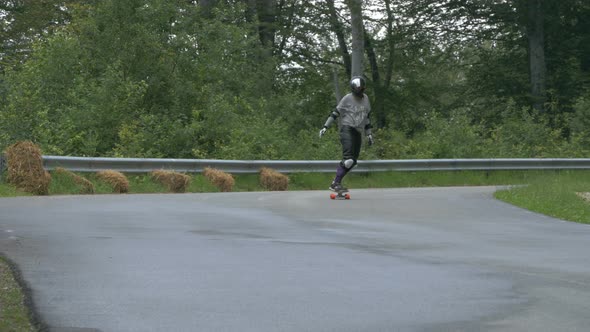 Person racing at a longboarding event