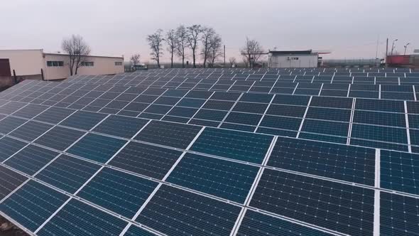 Solar panels in rural area. Solar energy panels in countryside from above