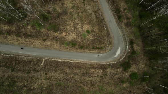 A Mountain Road on Which Electric Scooters Drive