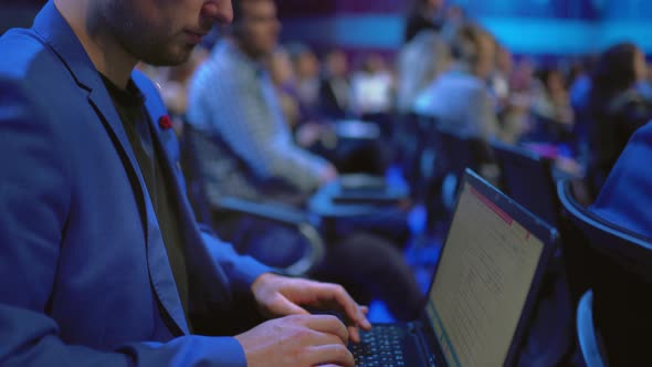 Person Typing Keyboard Notebook Forum Crowded Audience. Business Man Use Laptop