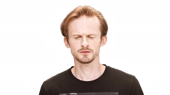 Angry Young Handsome Man Speaking Over White Background