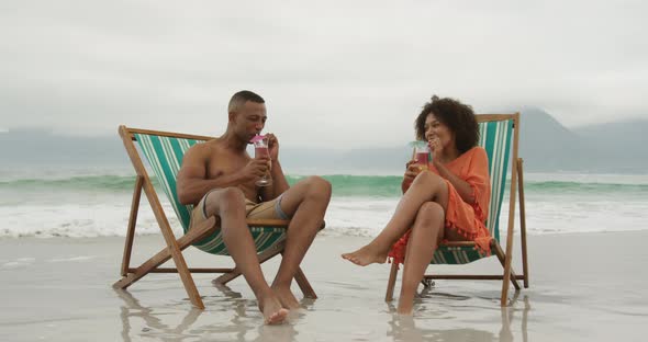 Couple enjoying free time by the sea