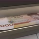 5000 South Korean won in cash dispenser. Withdrawal of cash from an ATM. - VideoHive Item for Sale