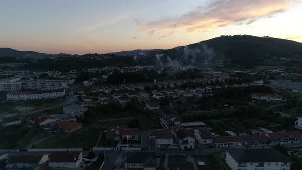 Aerial View of Residential Houses in Suburban Rural Area at Sunset