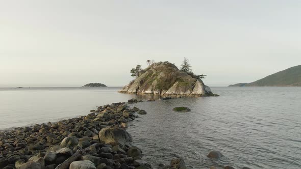 Aerial Panoramic View of Rocky Island on the Pacific Ocean West Coast