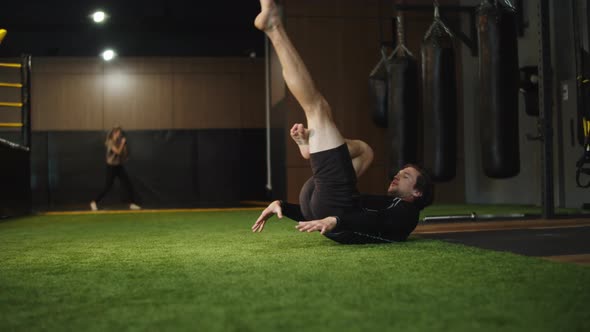 Sporty Male Boxer Warming Up in Sport Club. Sport Man Exercising at Gym