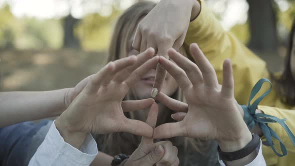 Closeup Three Caucasian Hippies Making Peace Sign Hands