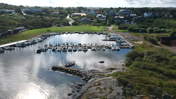 Aerial Drone Shot of A Small Marina at The Ocean Coastline