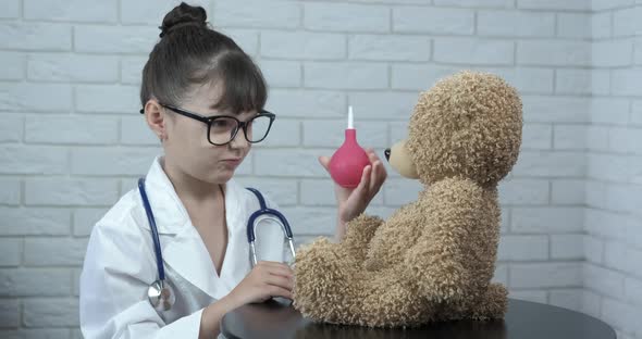 Doctor with sick teddy.