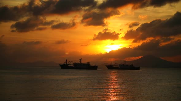 Fishing Boats on Sea in Sunset Lights in Sanya, Hainan, China