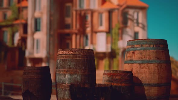 Old Wooden Wine Barrels in a Sea Town Port