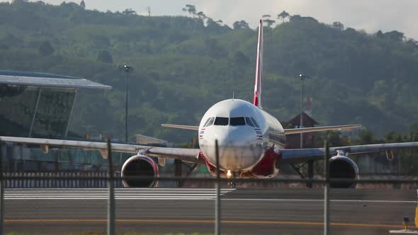 Plane Taxiing Along the Taxiway