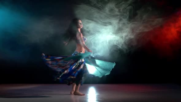 Talanted Belly Dance Movements of Young and Attractive Girl in Exotic Dress, Whirling, Slow Motion
