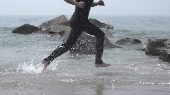 Man Jogging at the Beach