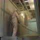 Worker in Protective Suit Sprays Powder Paint From Gun on Metal Products - VideoHive Item for Sale