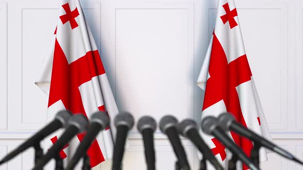 Georgian Official Press Conference with Flags alt