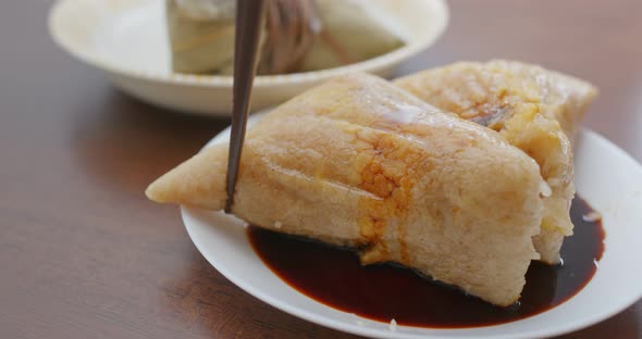 Chinese rice dumpling with soy sauces