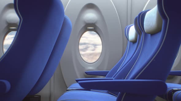 Airplane Interior Footage: Aerial View of Clouds through Window Zooming Over Seats 4K