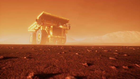 Big Yellow Mining Truck in the Dust at Career