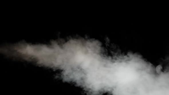 Water Vapor. White Jet of Vapour Steam Under Pressure on Black Background