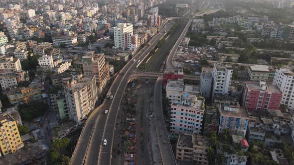 Drone aerial view of u loop highway in the middle of Indian city of Dhaka, Bangladesh