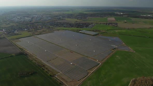 AERIAL: Establishing Shot of Solar Park That Produces Green, Environmentally Friendly Energy From