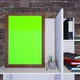 Empty photo frame with chroma key green screen, on book shelf with stationary - HD - VideoHive Item for Sale