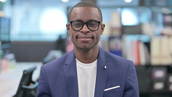 Portrait of African Businessman Smiling at Camera