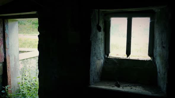 Pan From Window To Door In Derelict Old House