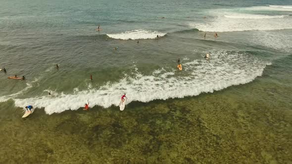 Surfers on the Water Surface