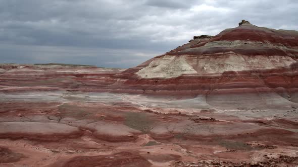 Rising aerial view of colorful red desert landscape